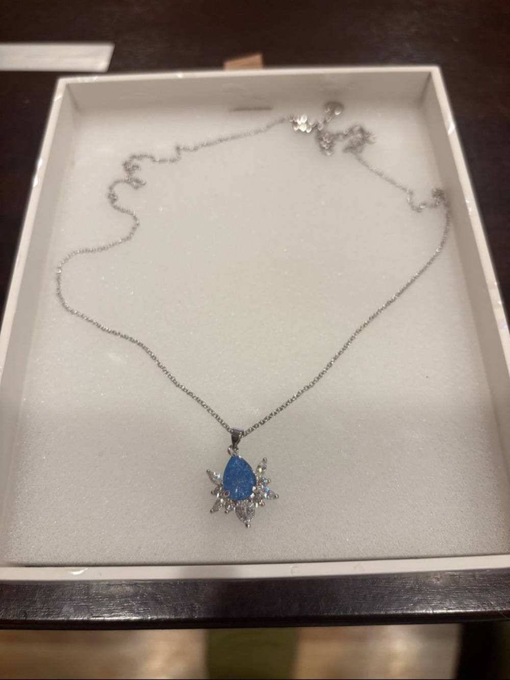 Blue Ice Crystal on Rhodium